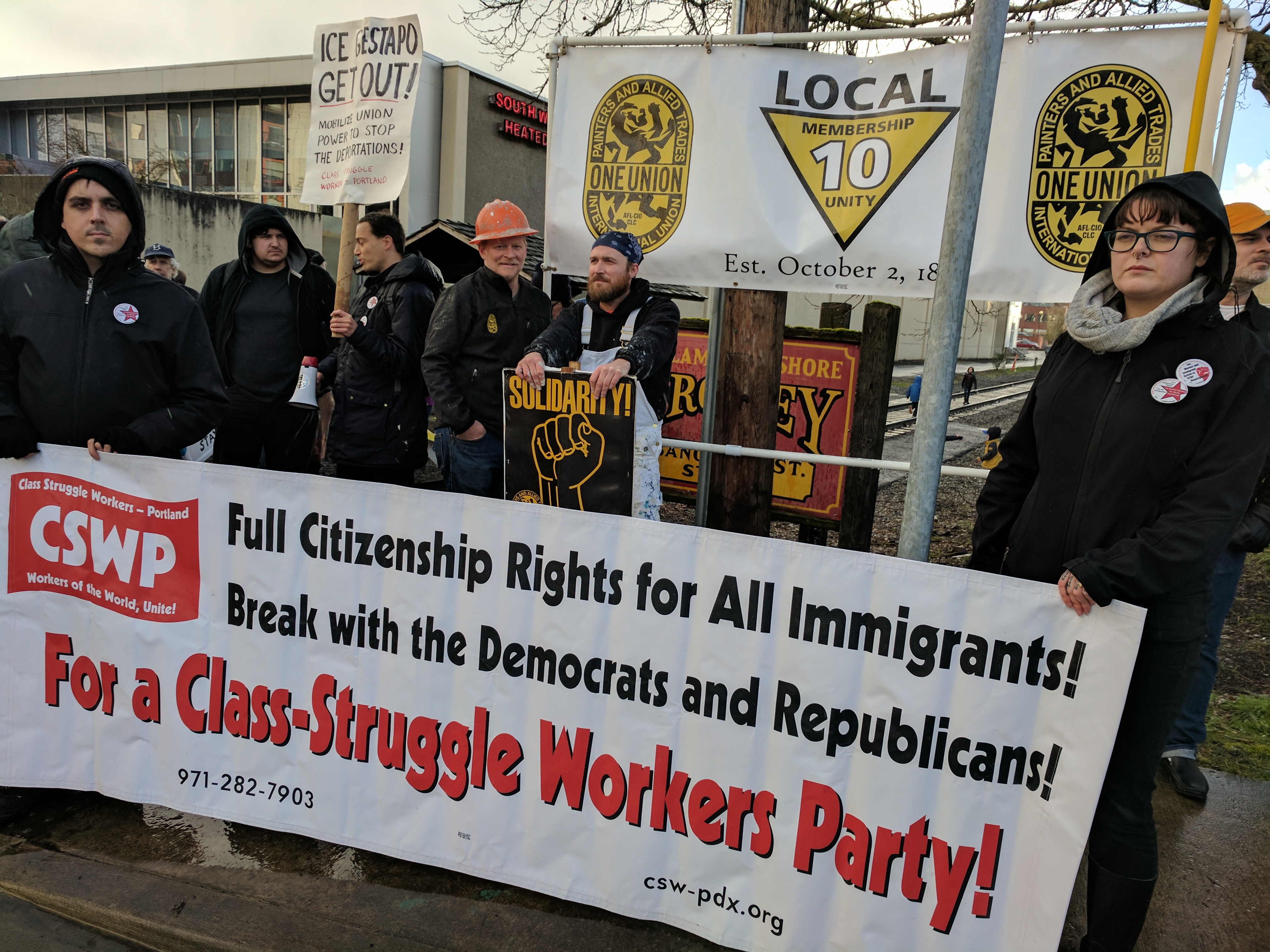 CSWP and IUPAT Local 10 banners at ICE Out of Oregon protest, 6 Mar 2017